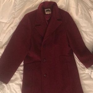 Burgundy knee length coat.